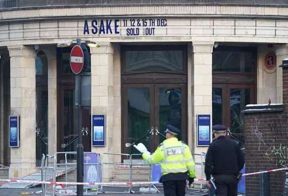 Police officers at the scene outside Brixton O2 Academy. Picture: PA