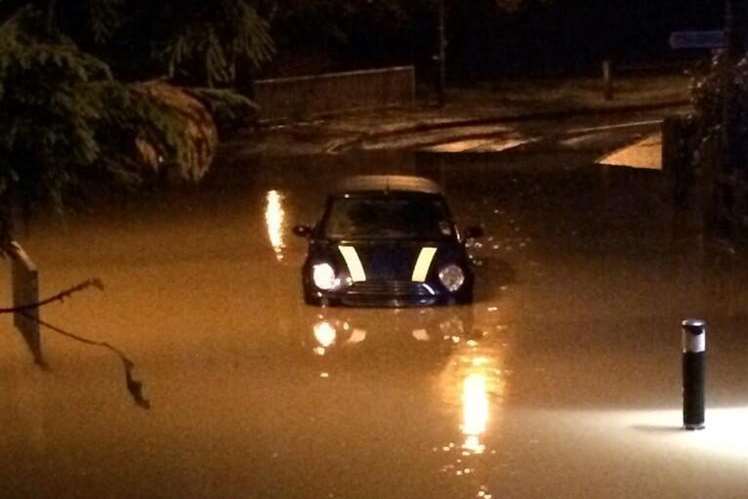 A Mini tackles heavy floods. Library picture