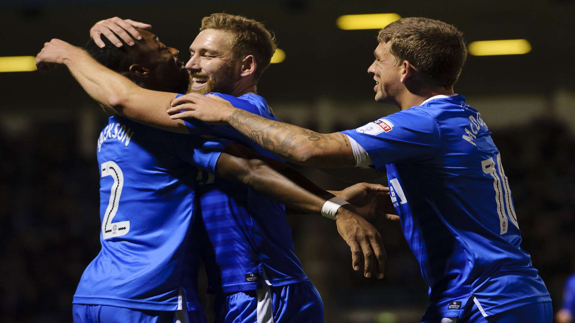 Celebrations after Cody McDonald's 25th-minute opener Picture: Andy Payton