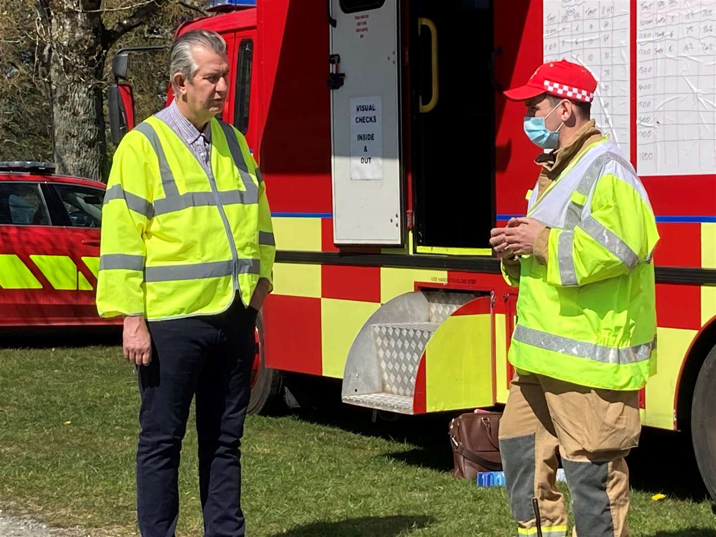 Mr Poots meets firefighters in Co Down (Rebecca Black/PA)