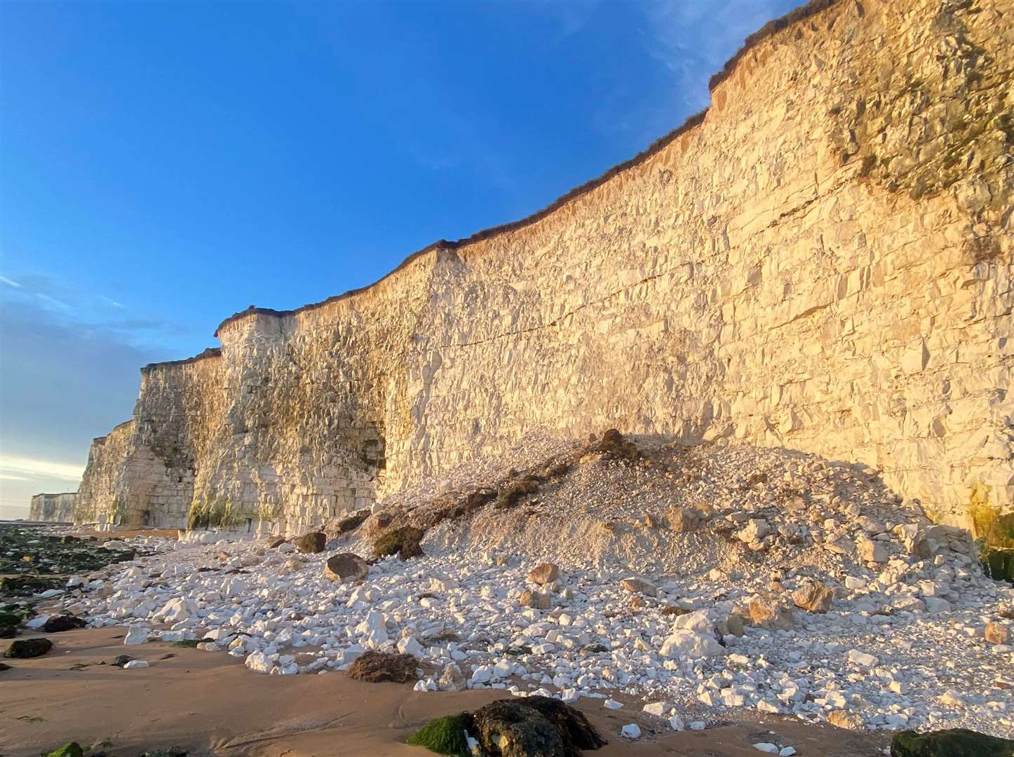 A dog walker says he has been reminded to never walk under cliff faces after seeing the remains of a huge rock fall at Stone Bay in Broadstairs. Picture: Stephen Bailey