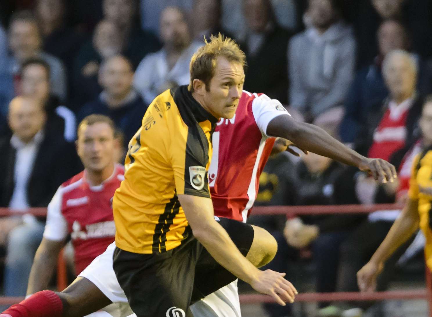 Stuart Lewis in the thick of things on his Ebbsfleet return Picture: Andy Payton