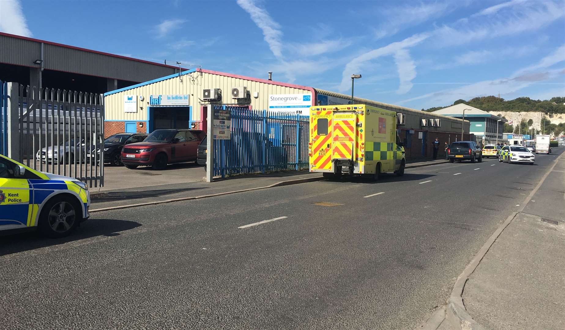 Three police cars and three ambulance vehicles were at the business