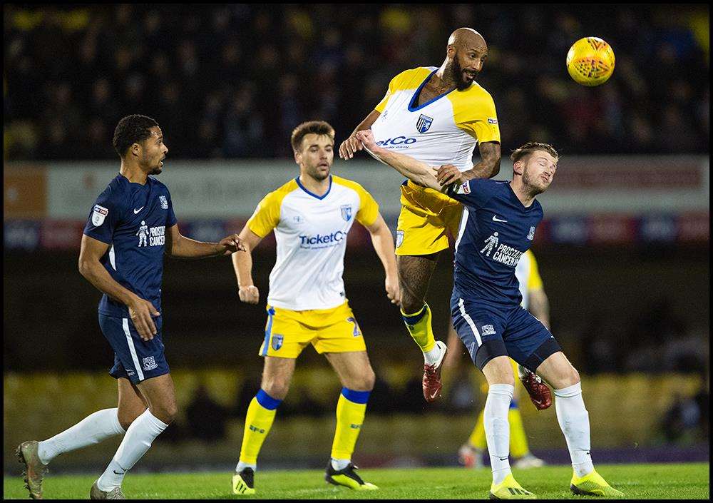 Josh Parker heads at goal for Gillingham Picture: Ady Kerry (6275680)