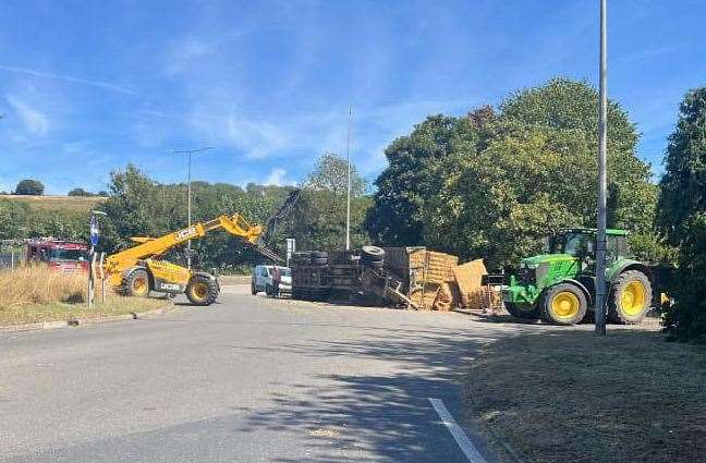 A trailer carrying straw overturned on the A20 in Charing. Picture: Jon Barrett