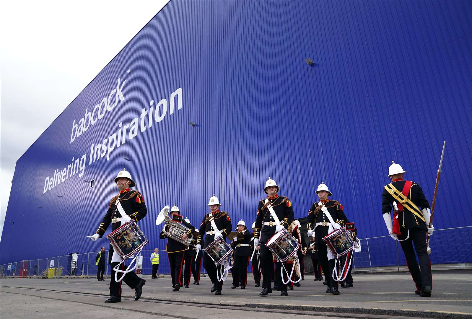 The Royal Marine Band leave The Venturer Building after the ceremony (Andrew Milligan/PA)