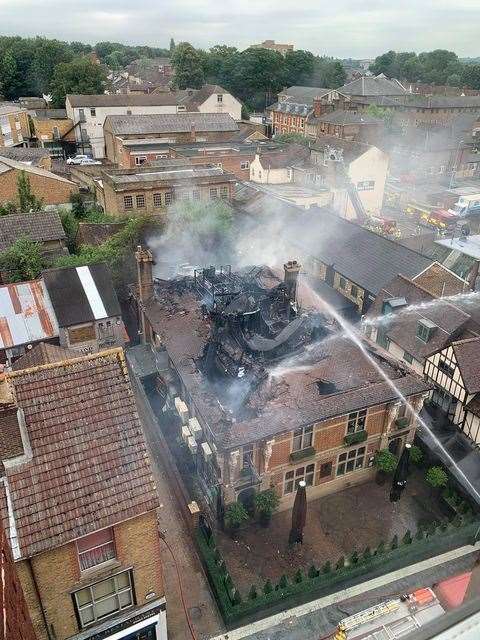 The fire destroyed the roof of the building in Week Street. Picture: Petra Kovacsova