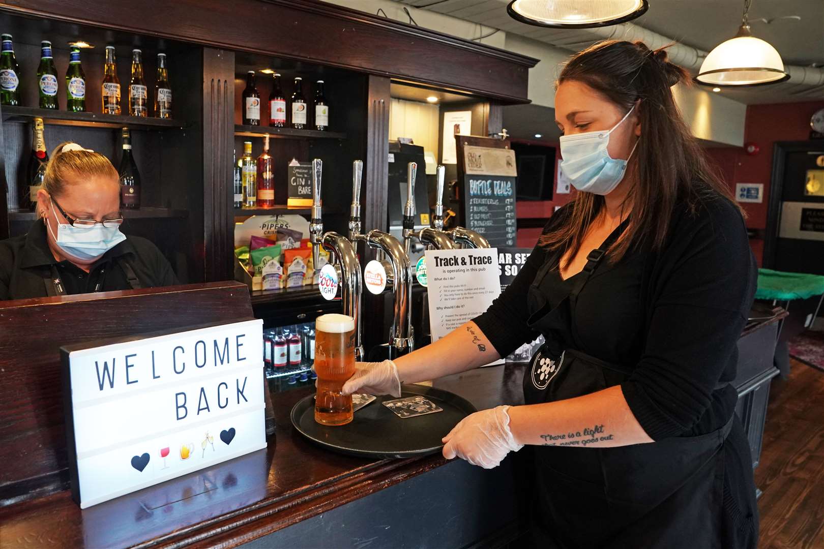 Pubs welcomed customers back for the first time in more than three months on Saturday (Owen Humphreys/PA)