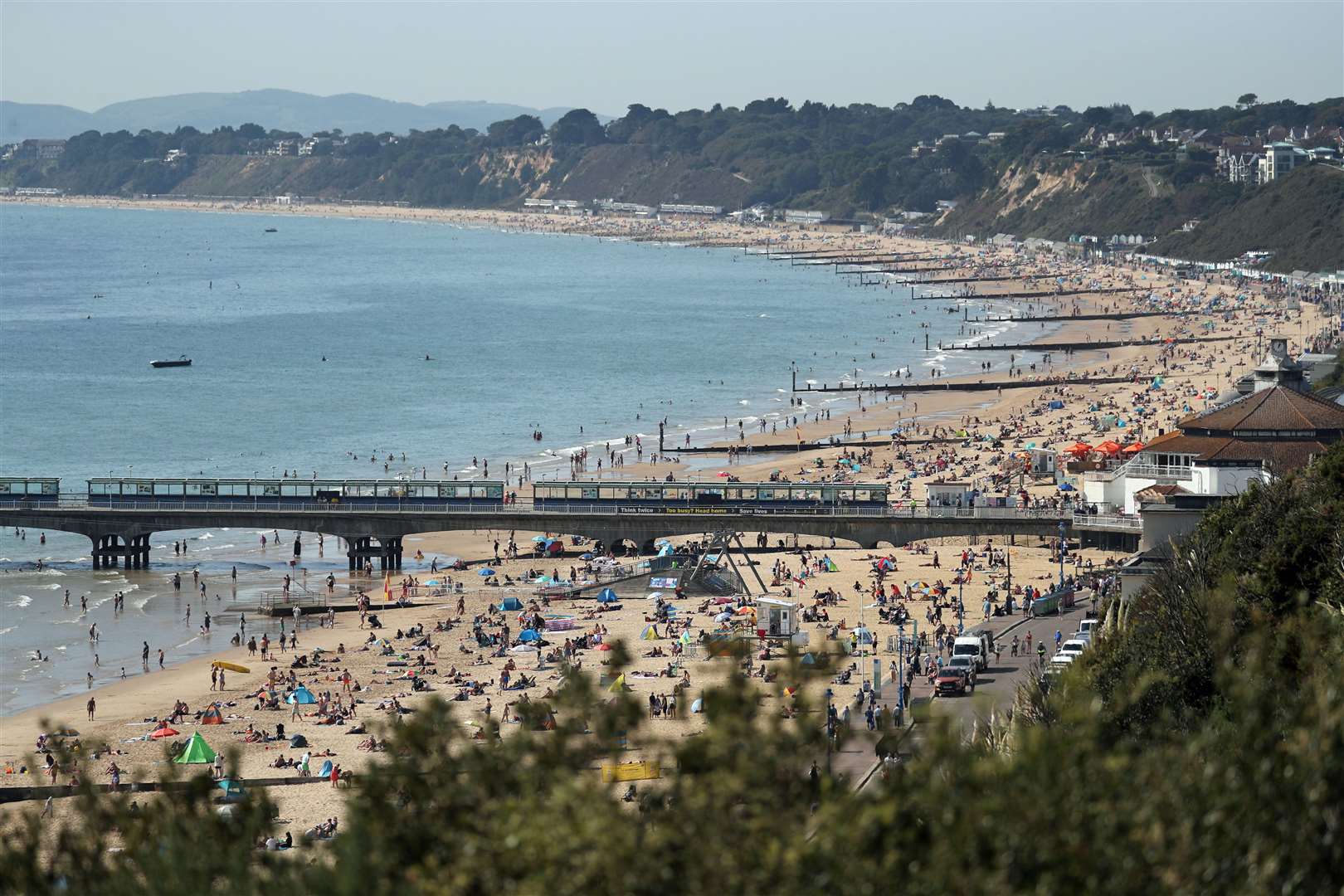 People enjoying warm autumn weather on Bournemouth beach (Andrew Matthews/PA)