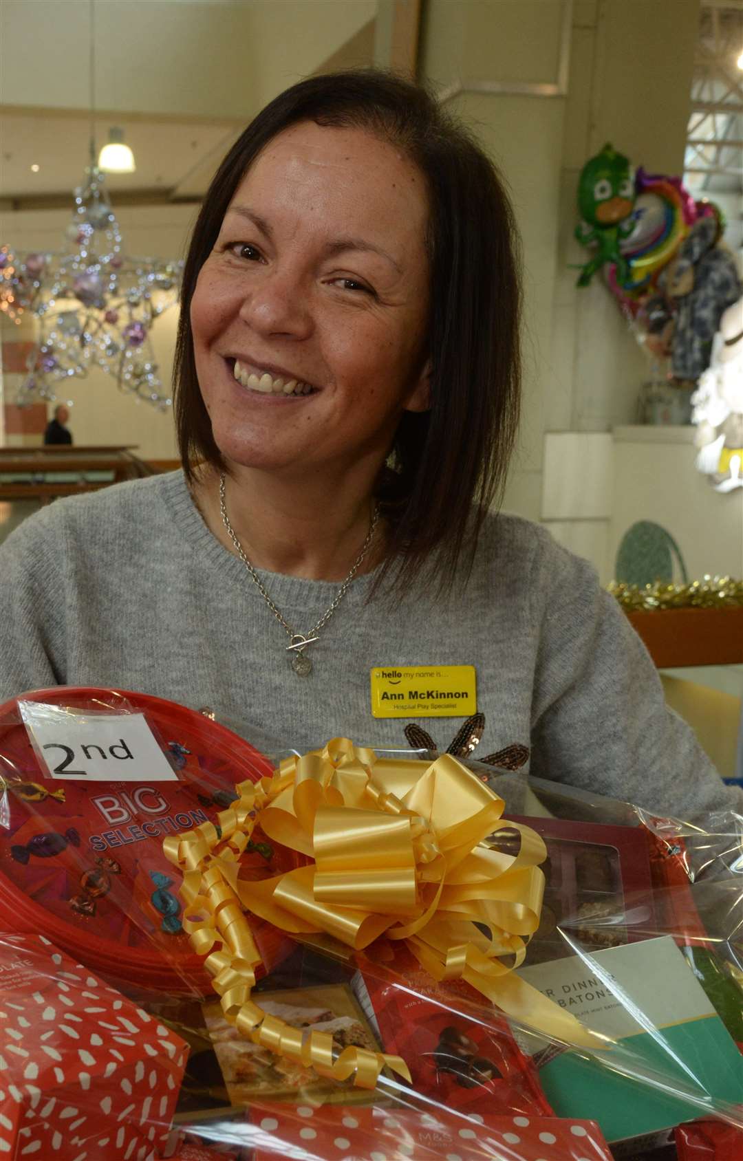 Ann McKinnon, play leader at Medway Maritime Hospital children's ward selling raffle tickets at Hempstead Valley Shopping Centre