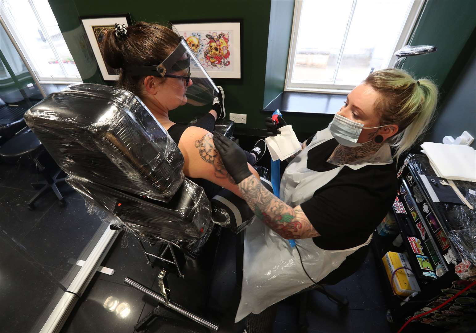 Tattoo studios already use high levels of PPE (Andrew Milligan/PA)