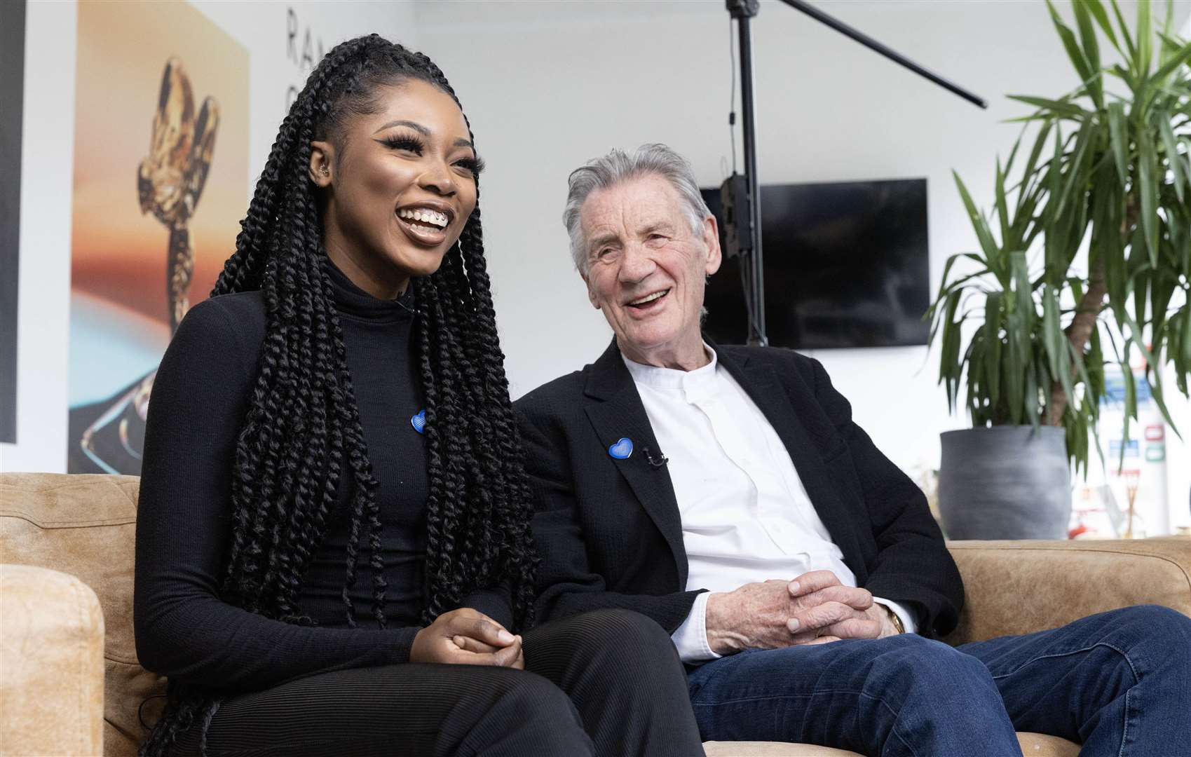 Nafisat Ibrahim, 25, from London and Michael Palin during a photoshoot with Rankin as part of a new exhibition led by NHS Charities Together (Matt Alexander/PA)