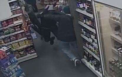 The moment the Twydall Premier shop owner wrestled with the alleged armed robber