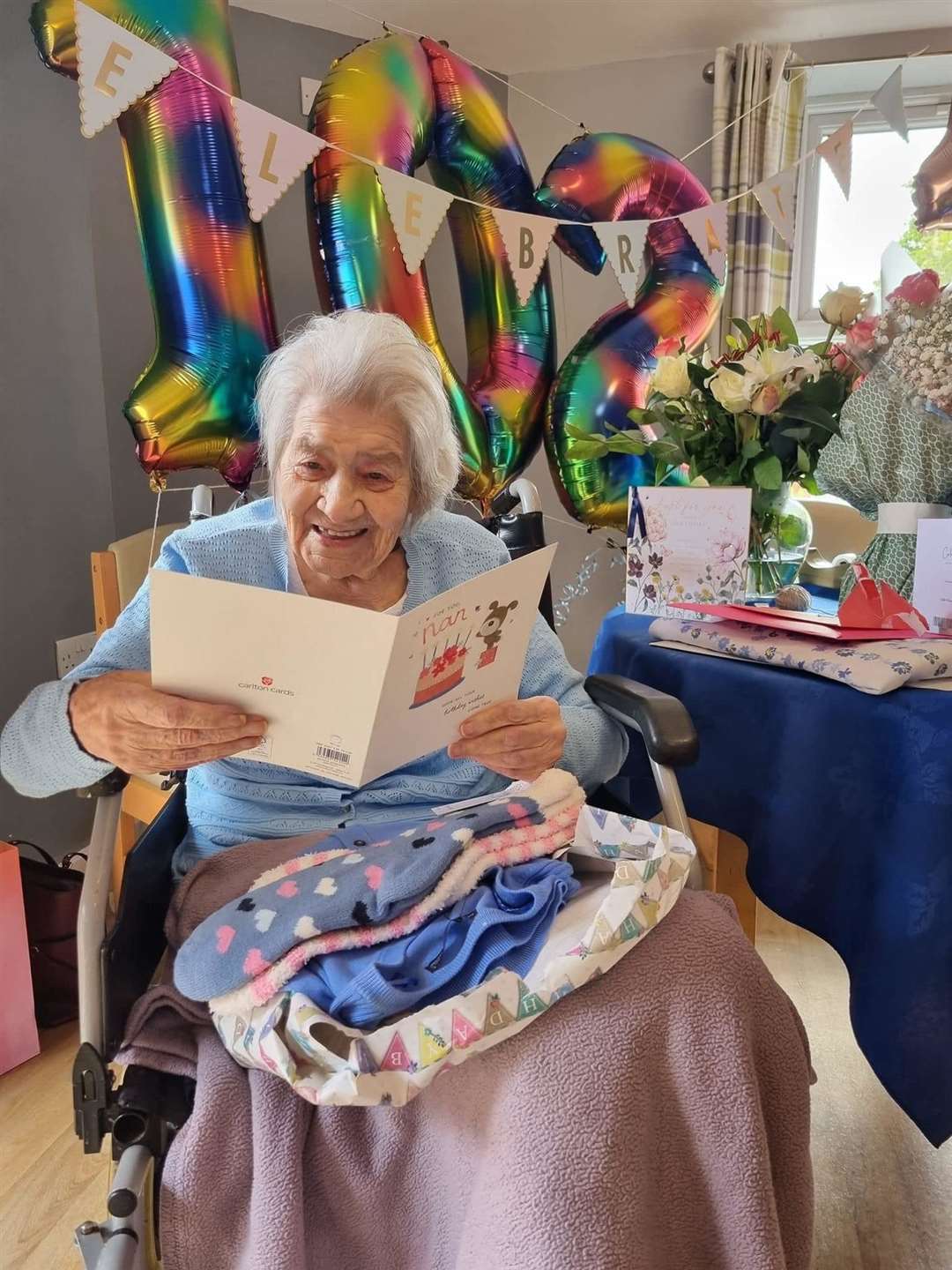 Emily reading one of her many birthday cards. Picture: Lorraine Milton