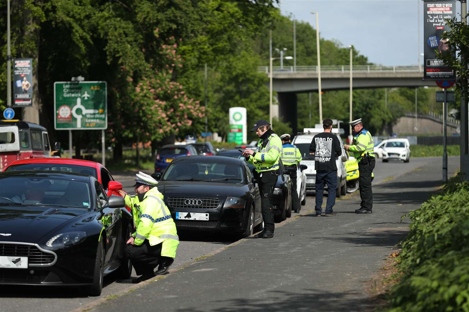 Police talk to motorists near Brighton about the reason for their journeys (Yui Mok/PA)