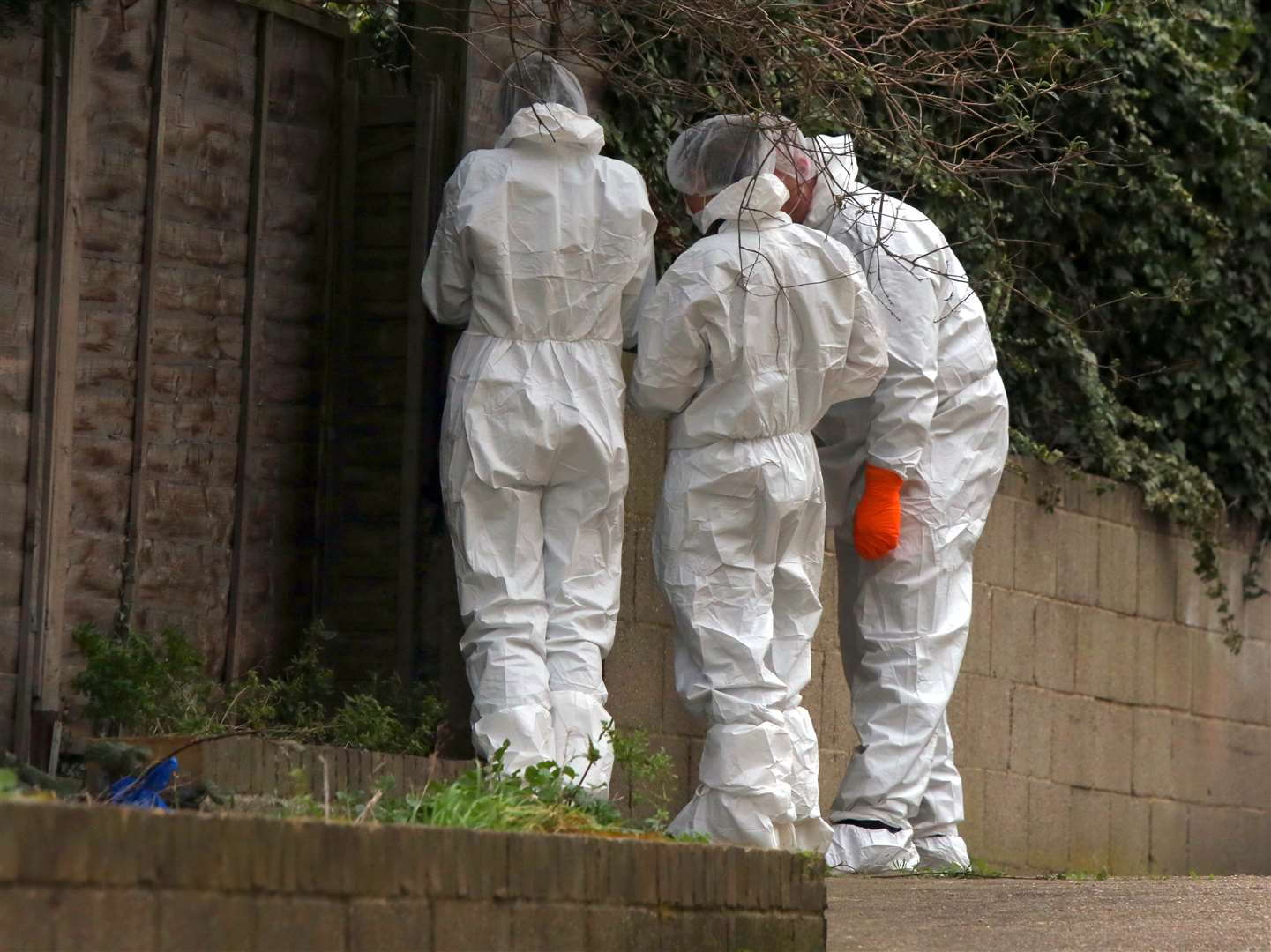 Forensics officers in Hamerton Road, Northfleet, following the incident. Pictures: UKNIP