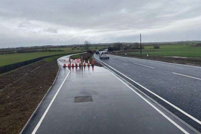 The new cycle path along the Lower Road in Minster is closed because it is flooded. Picture: Adam Baker