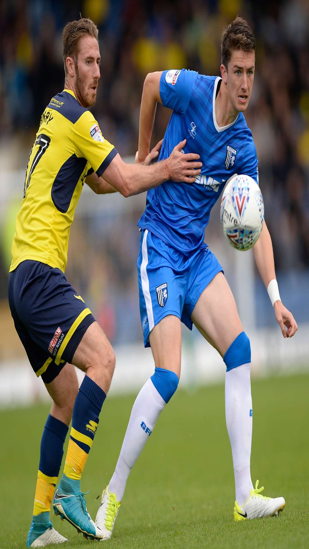 Alex Lacey gets ahead of Oxford's James Henry. Picture: Ady Kerry