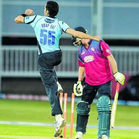 Sussex bowler Umar Gul celebrates the dismissal of Kent skipper Rob Key.