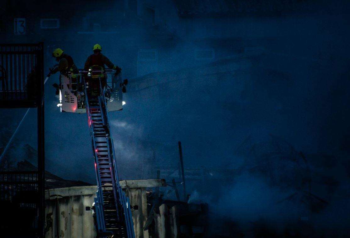 Firefighters remain at the scene of a blaze at a Dartford coffee factory. Picture: @chrispiela (4756076)