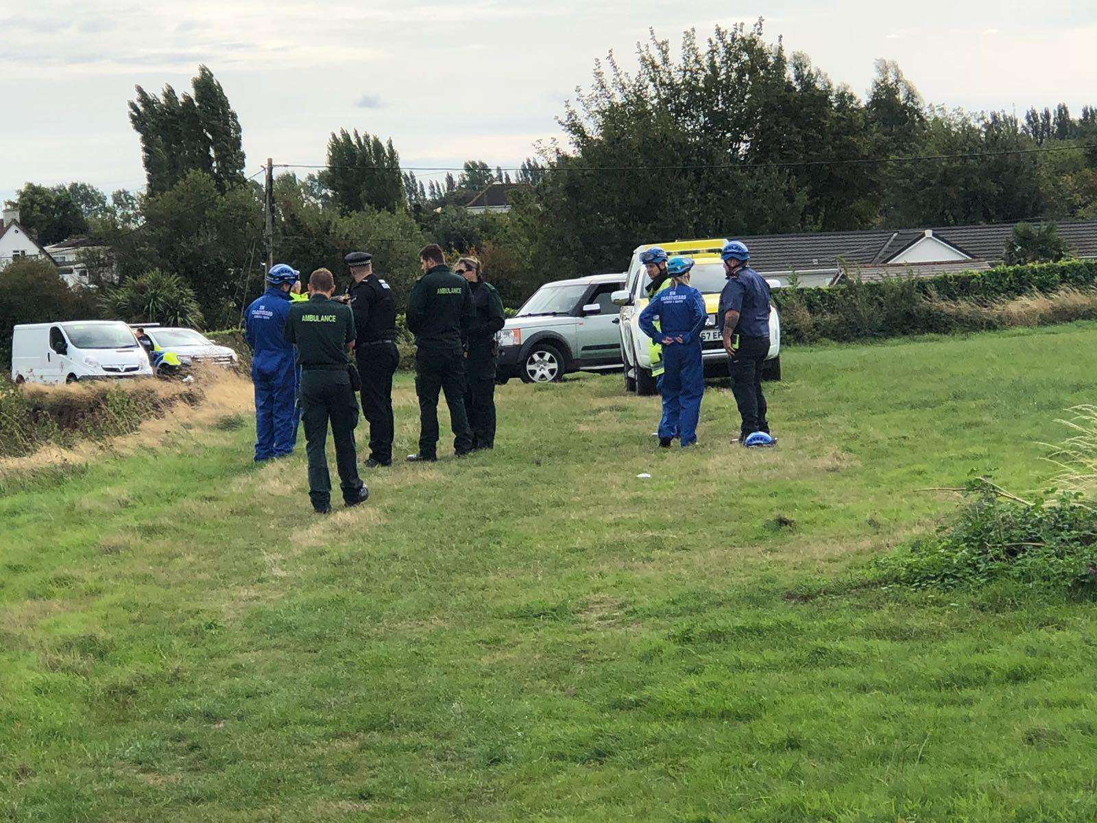 Coastguard and other rescue officials at the top of the cliffs in Minster. Picture: Mark Holmwood