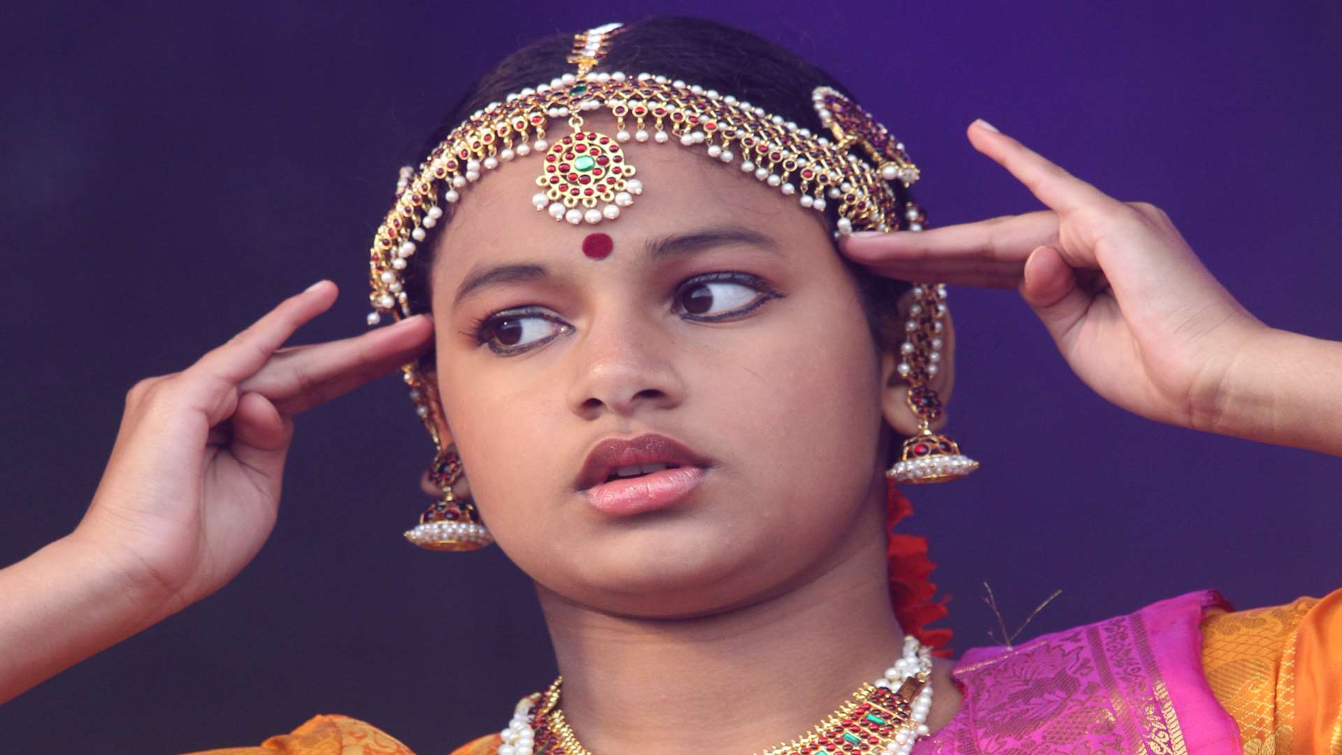 Priya Boby from the Kerala Cultural Association in Maidstone dances at Maidstone Mela at Mote Park in Maidstone