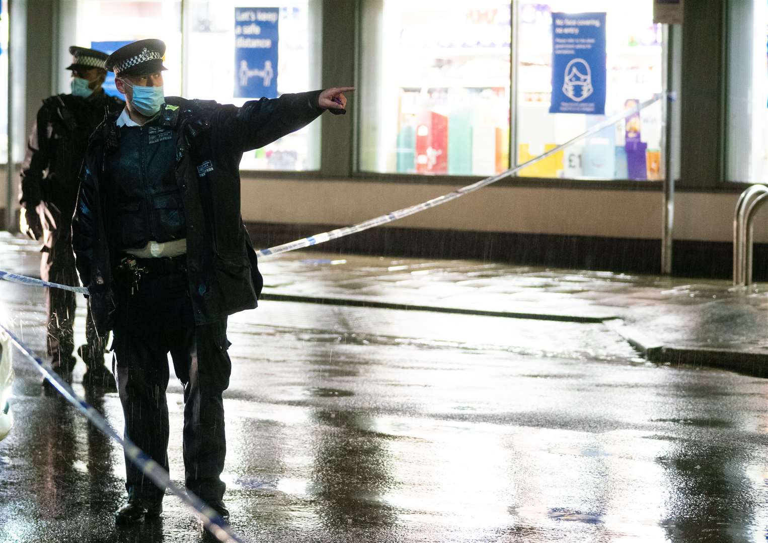 Police at the scene of a stabbing incident in Willesden Lane, in Kilburn, north-west London, on Saturday, in which one man died (Dominic Lipinski/PA)