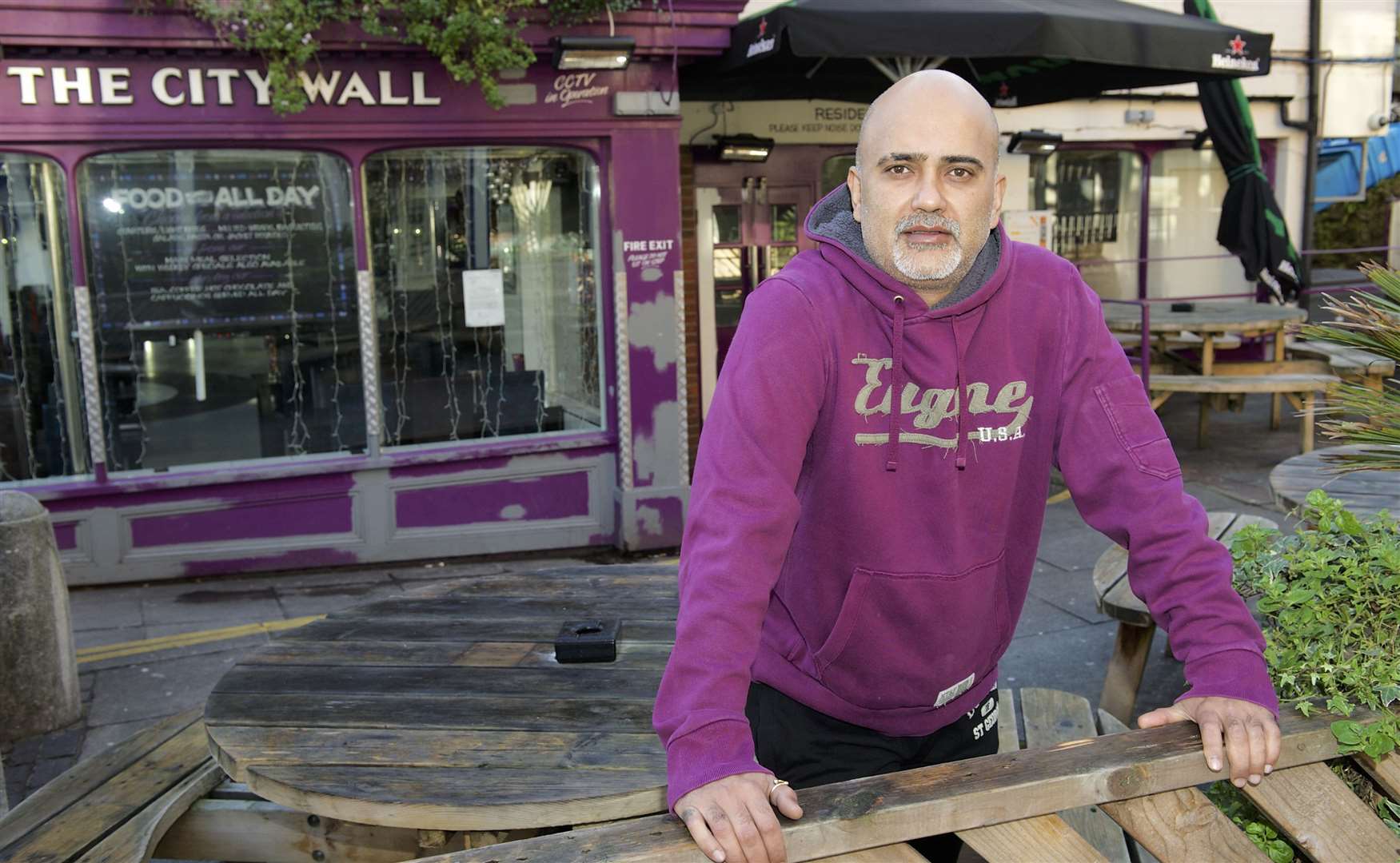 Sanjay Raval, owner of the City Wall Wine Bar in High Street, Rochester fought to keep the outdoor area after Medway Council began legal action to remove it. Picture: Andy Payton