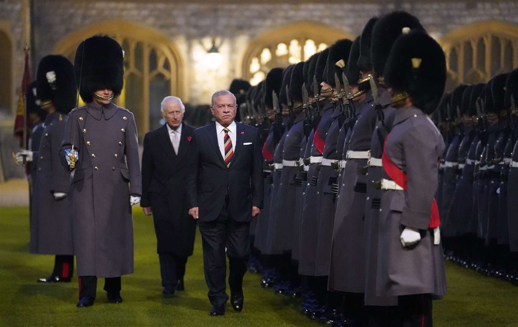 King Abdullah II of Jordan and the King inspect the Guard of Honour at Windsor Castle (Andrew Matthews/PA)