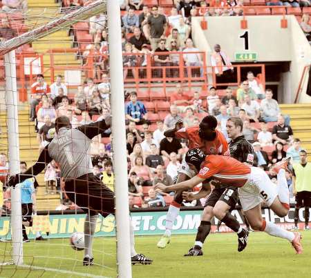 Miguel Llera scores the opening goal for Charlton against Walsall