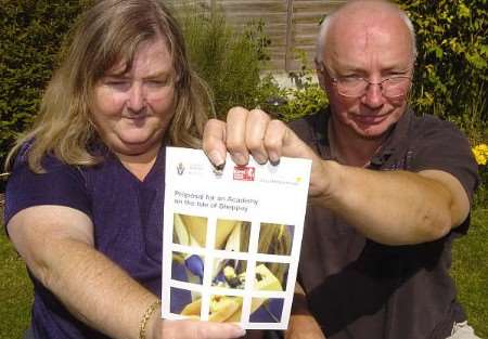 Theresa Langworthy and Tony Batchelor with consultation document for the proposed academy. PICTURE: Andy Payton