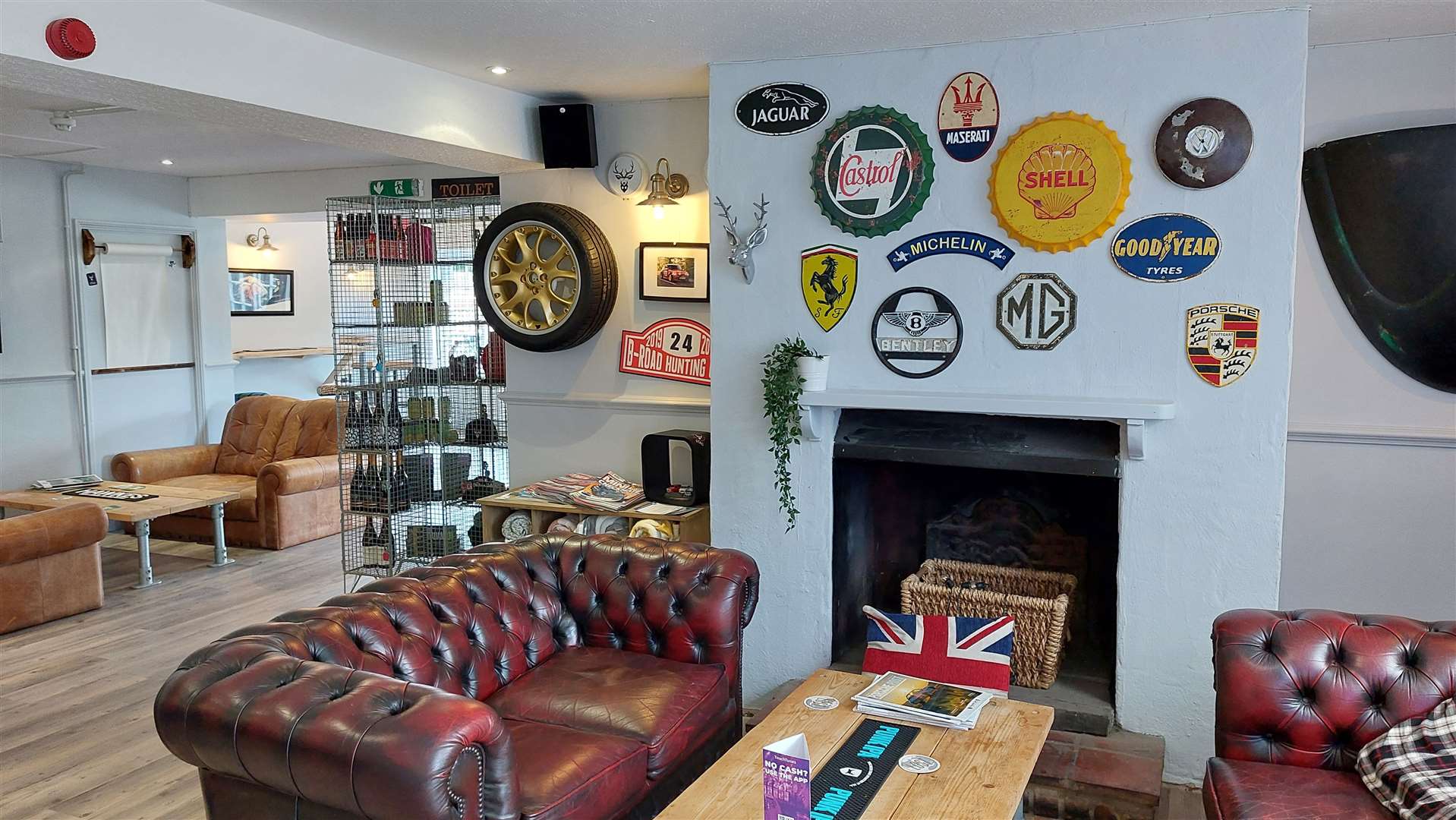 Car memorabilia decorates the walls throughout