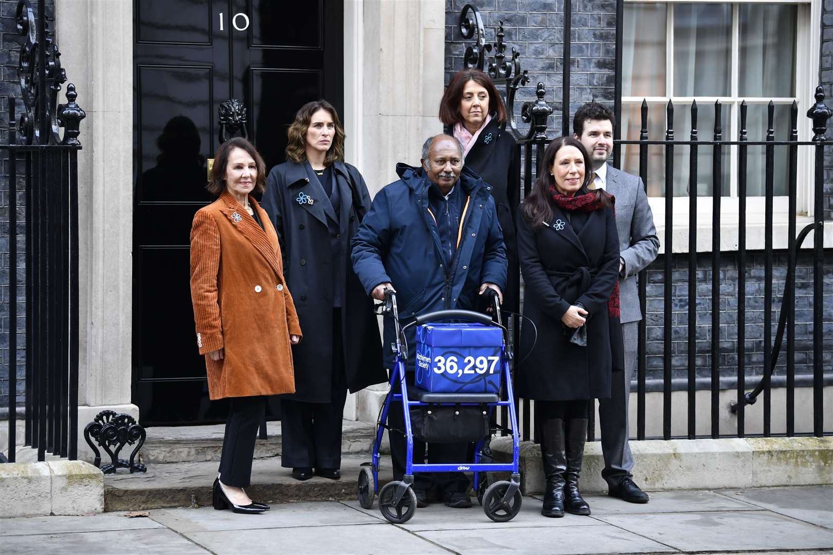 Vicky McClure (second left) with Dame Arlene Phillips, Ananga Moonesinghe, who lives with dementia, Kate Lee, chief executive of Alzheimer’s Society, Debbie Abrahams MP and Elliot Colburn MP delivering an open letter to 10 Downing Street demanding the Government urgently fulfil their promises on dementia (Beresford Hodge/PA)