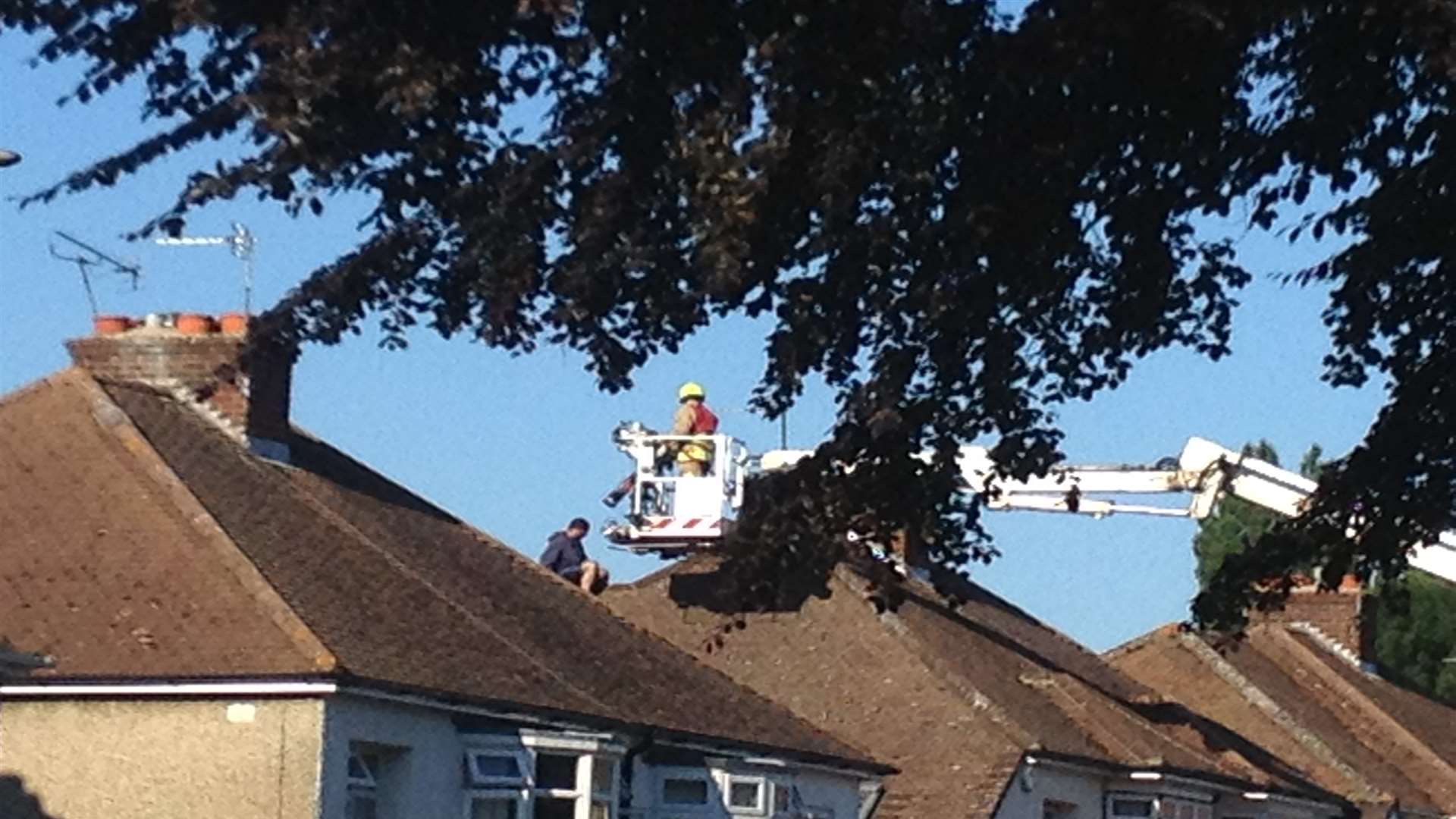 A cherry picker was used to bring the man down to safety