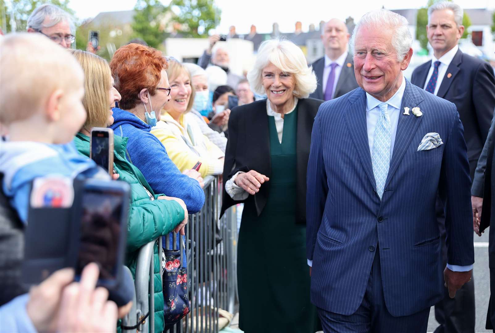 The Prince of Wales and the Duchess of Cornwall meet well-wishers during a visit to Bangor Market (Chris Jackson/PA)