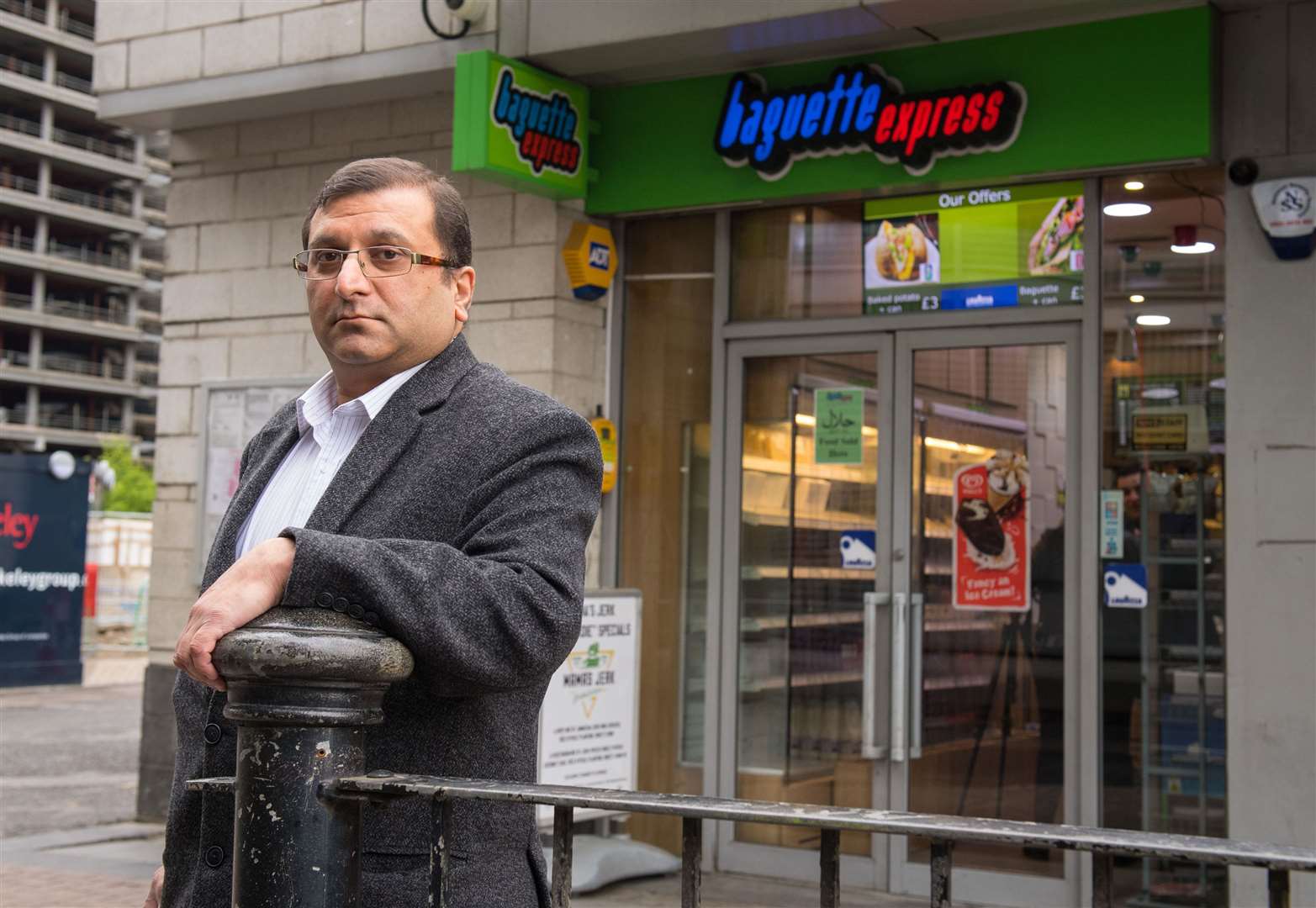 Ihsan Bashir outside his family’s business in Docklands (Dominic Lipinski/PA)