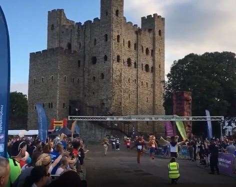 The mascot race finishes with the costumed runners crossing the line with Rochester Castle as a stunning backdrop. Picture: Cllr Alex Paterson/Twitter
