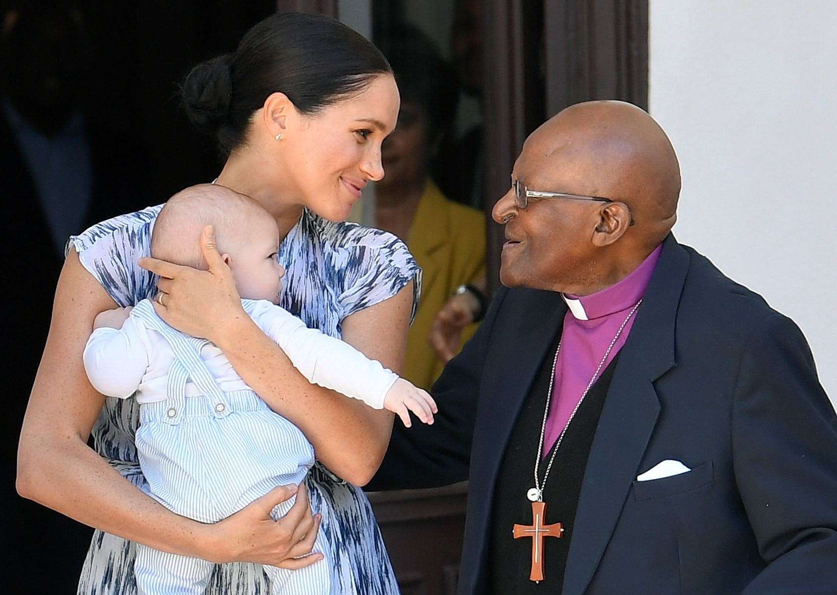 The Duchess of Sussex with son Archie meeting Archbishop Desmond Tutu in cape Town (Toby Melville/PA)