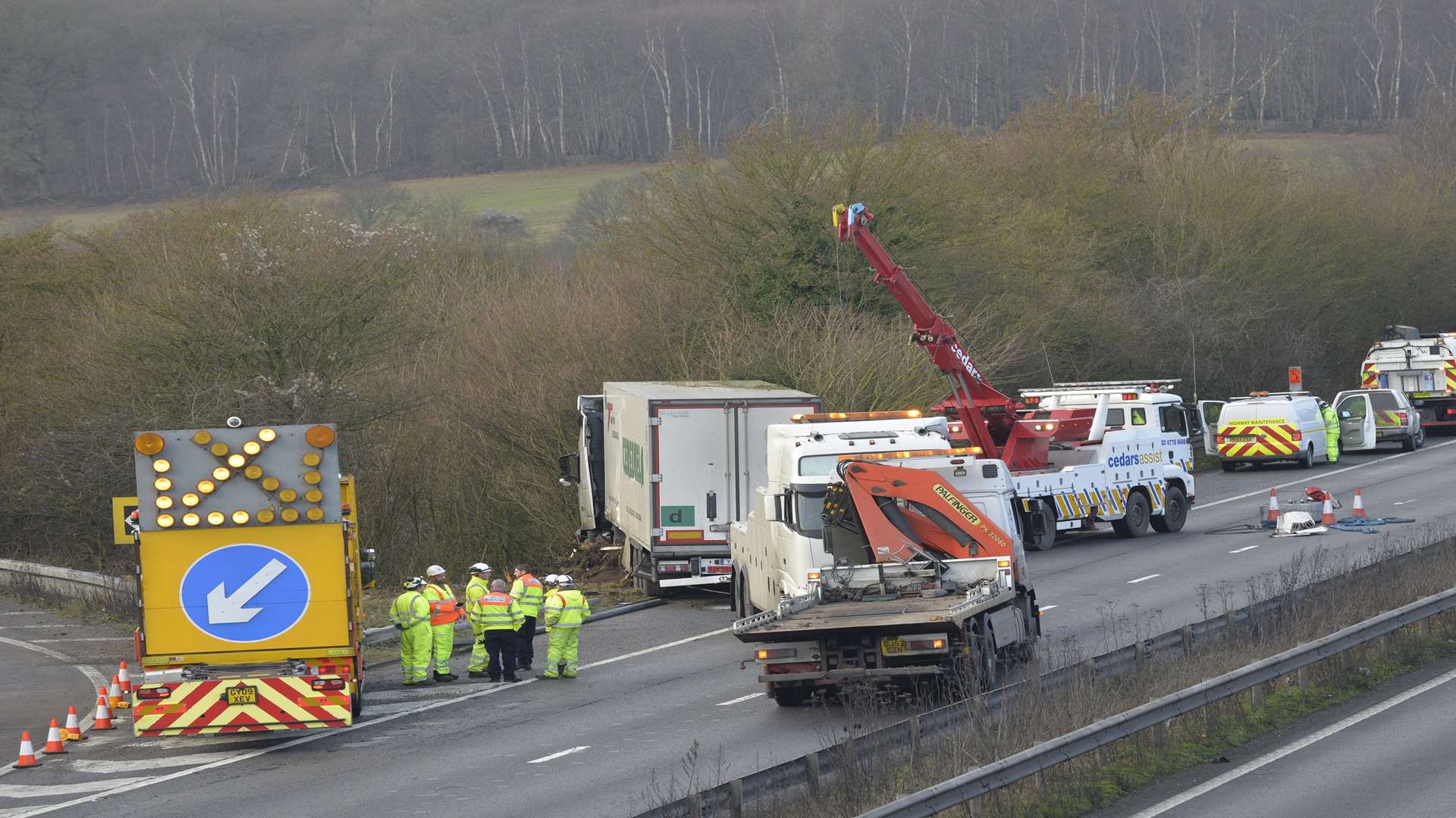 The stricken lorry being hauled up the bank. Picture: Ruth Cuerden