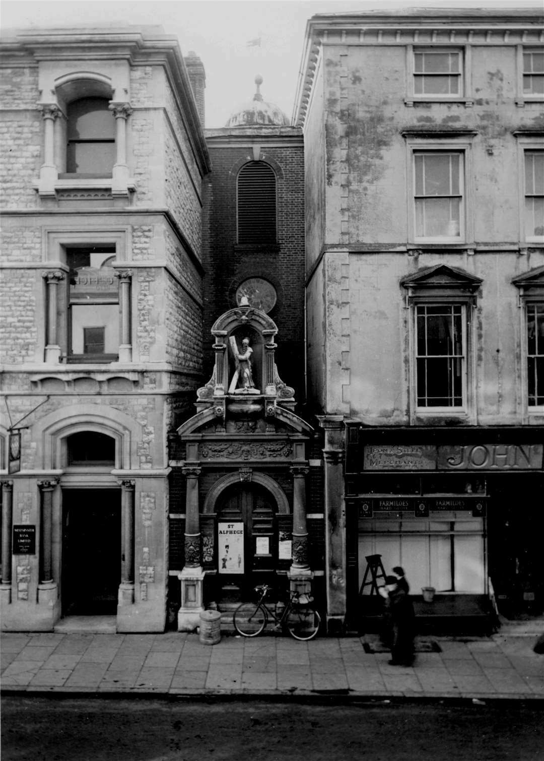 The Georgian tower of St Andrew's Church in The Parade, Canterbury, is pictured in January 1954. It was demolished two years later. The site is now part of Natwest