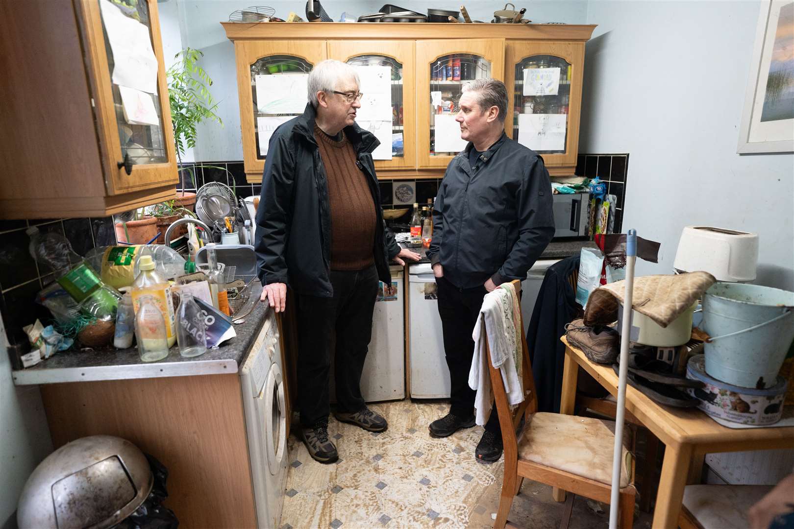 Labour Party leader Sir Keir Starmer meets Ian Clement, whose house in Loughborough, East Midlands, flooded during Storm Henk, on Monday (Stefan Rousseau/PA)