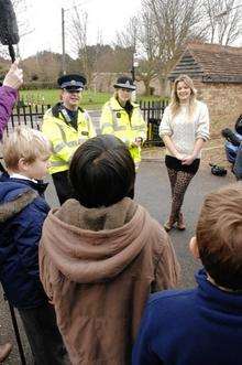 Emily Slater speaks to pupils at Barham School after she was stopped during the spped check in Barham