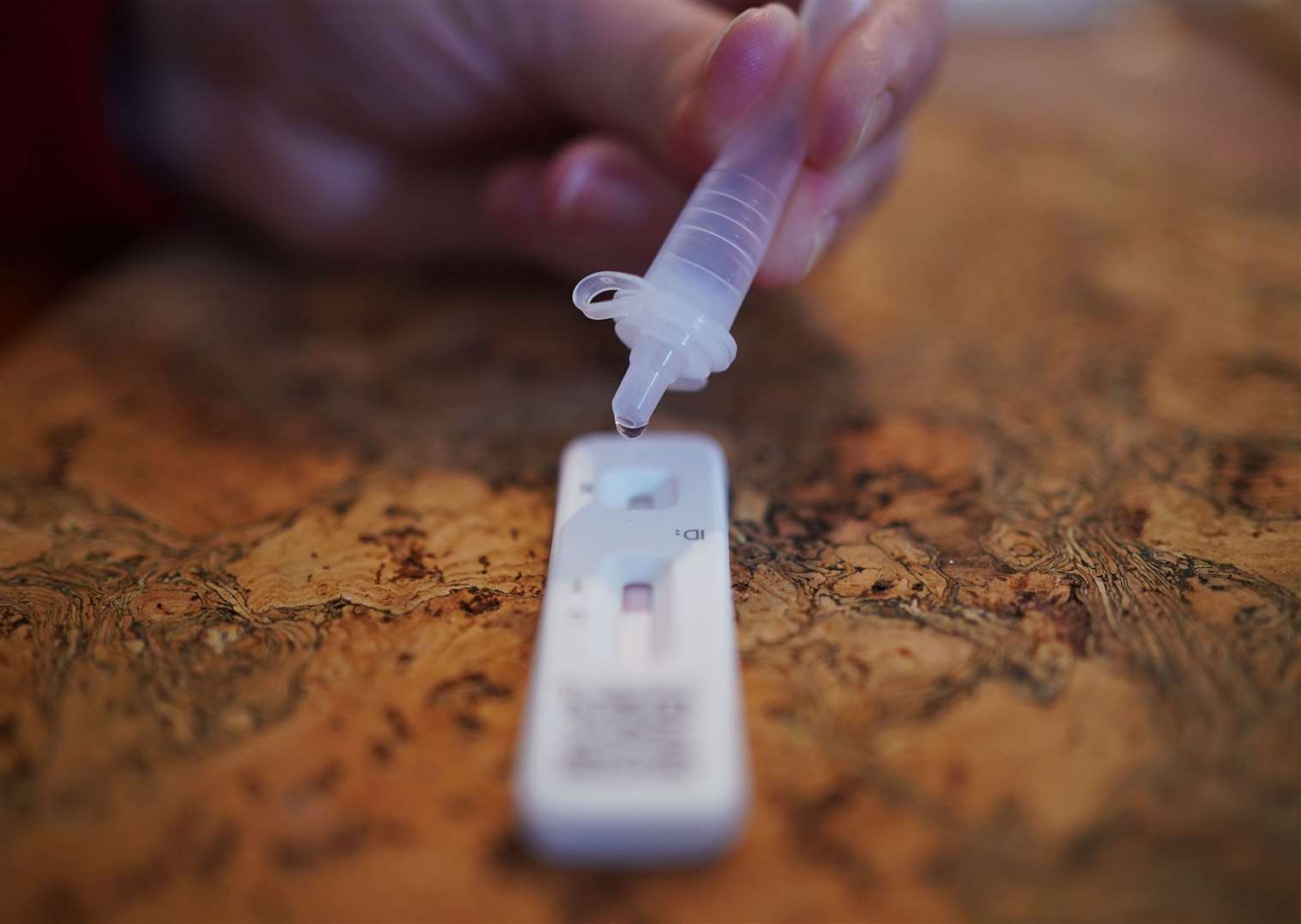 A woman taking a lateral flow test in a household in Devon. (Yui Mok/PA)