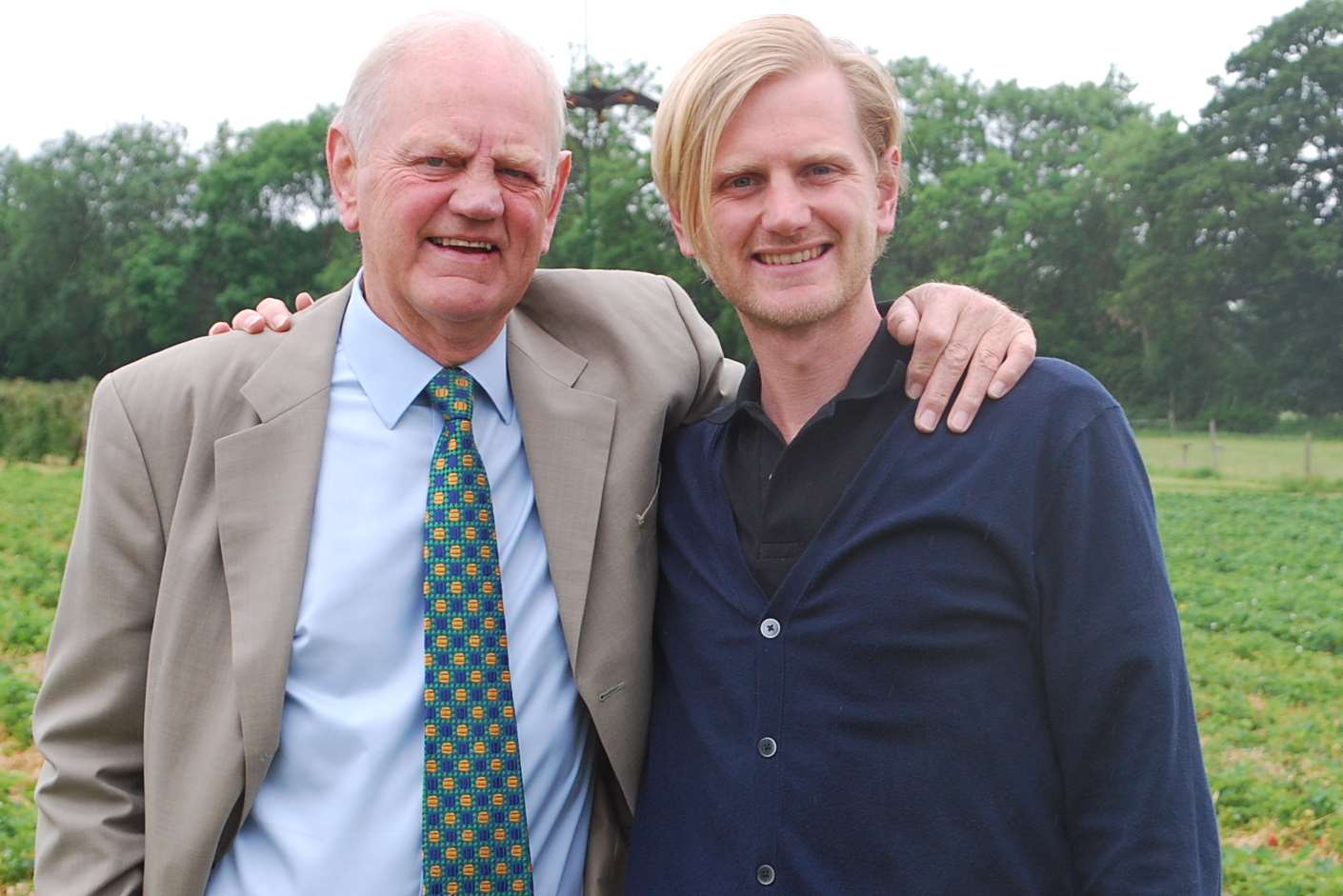 Train singer Martin Clews with his son Dan