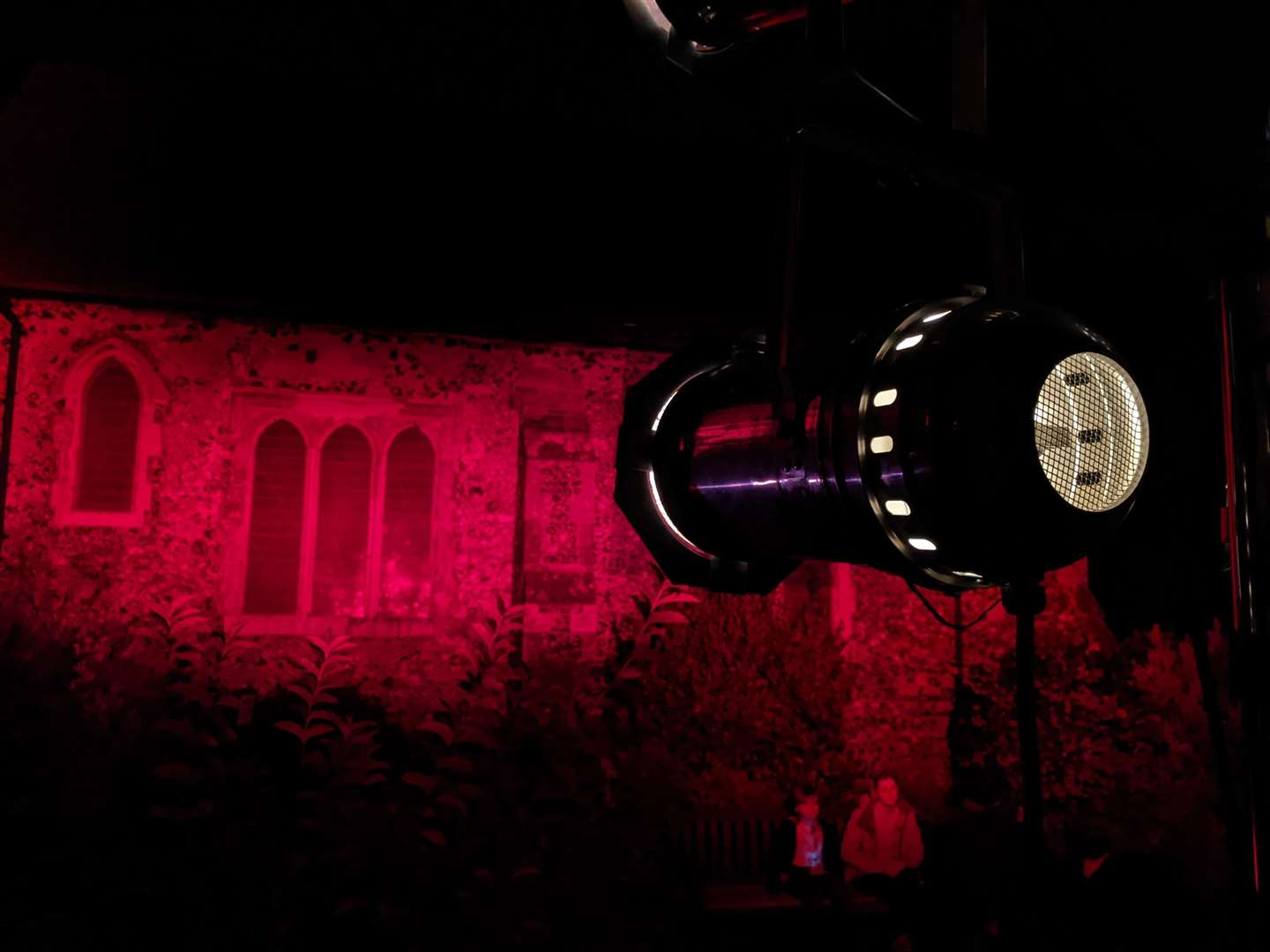 Borden parish church lit up in poppy red by Dan Skinner to commemorate Armistice Night