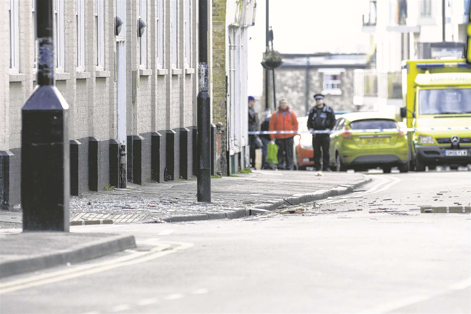 Broken glass and roofing slates, the scene in Northdown Road, Margate