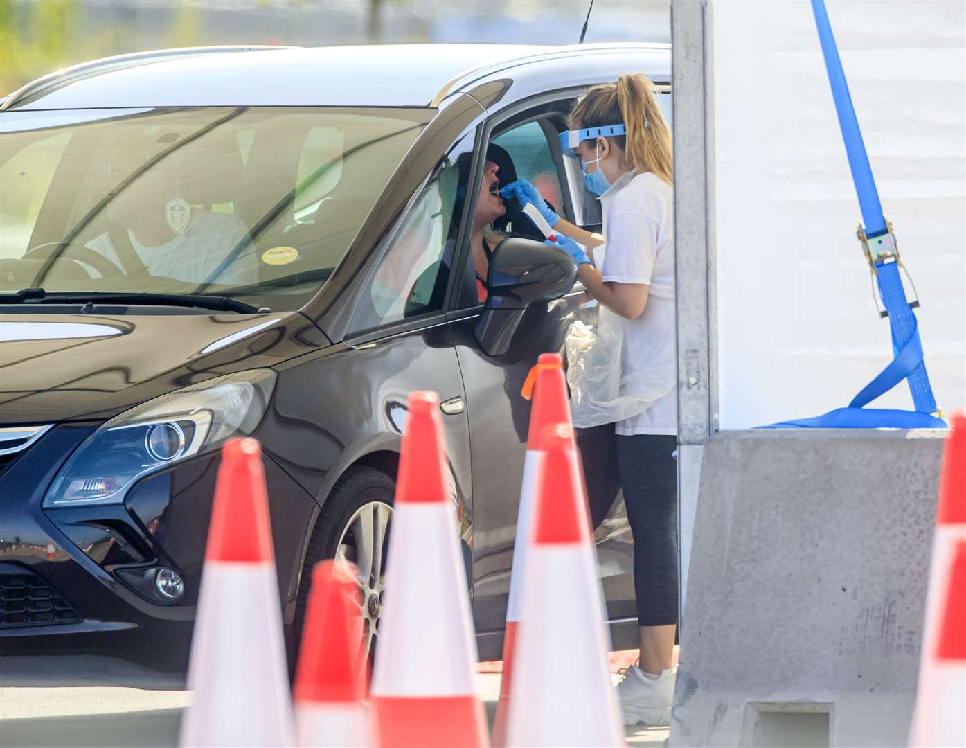 Samples are taken at a coronavirus testing facility in Temple Green Park and Ride, Leeds (Danny Lawson/PA).