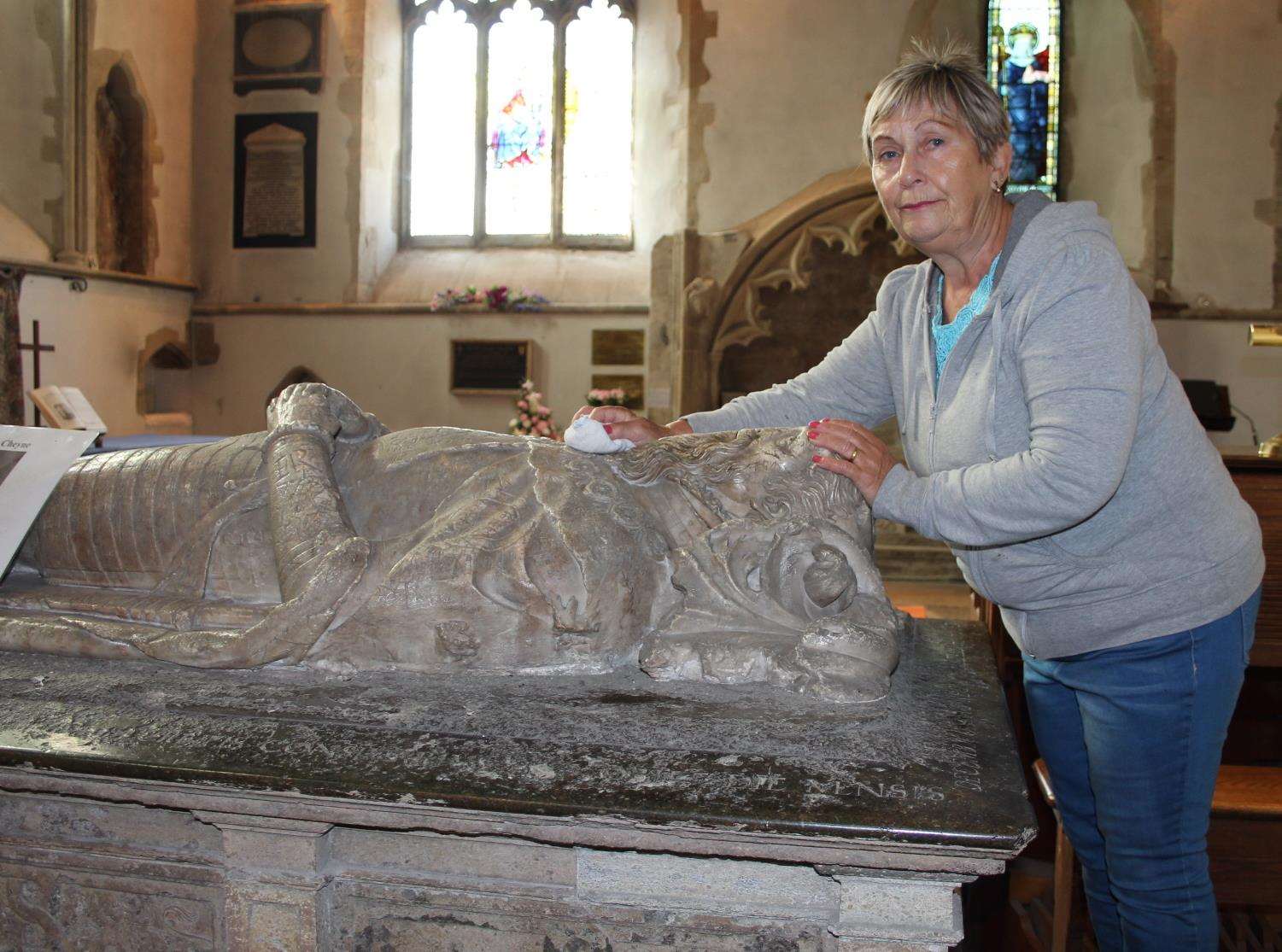 Church warden Brenda Smith cleans up the tomb of Sir Thomas Cheyne at Minster Abbey, Sheppey, after a tomato ketchup attack (3906795)