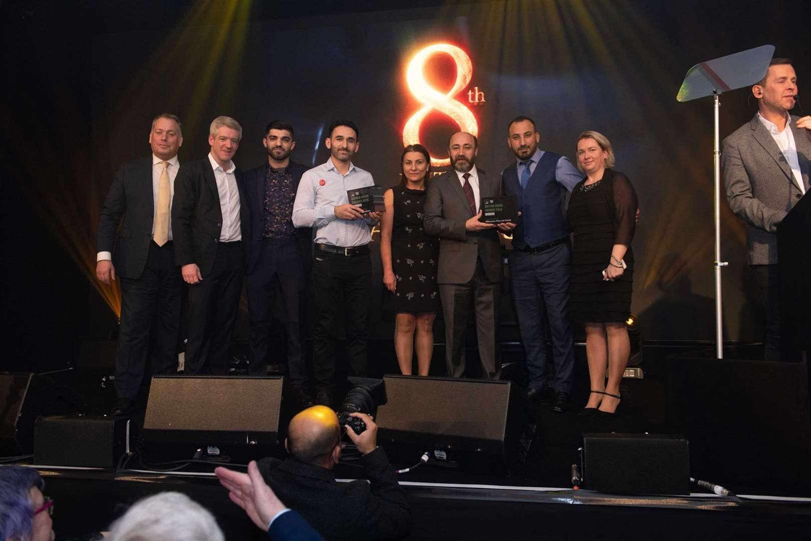 Members of the Dogan family (left of centre) pick up with British Kebab Award. (30919380)