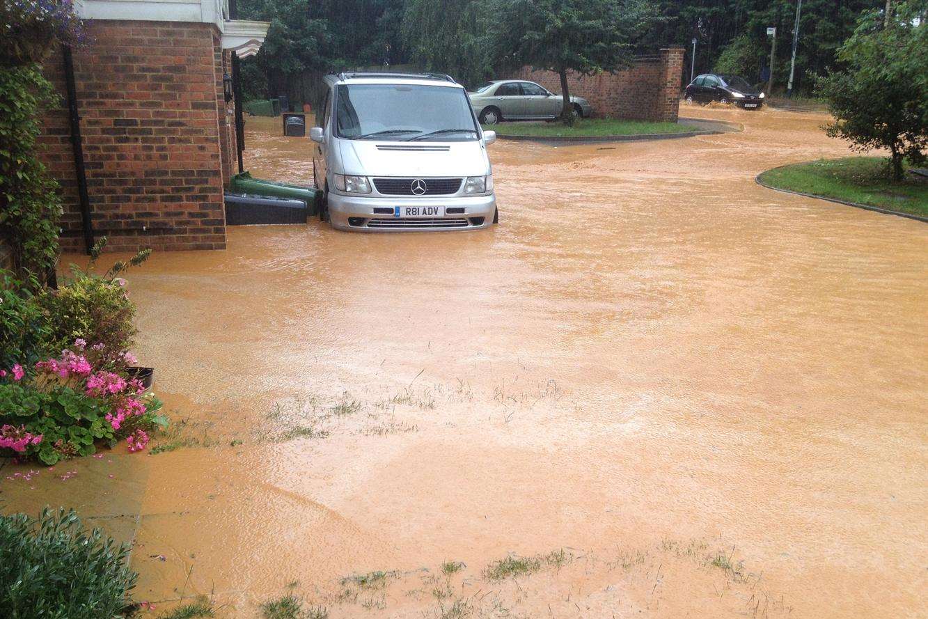 Paygate off Sutton Road was flooded after clay from Imperial Park development was washed down the hill during heavy rain on Sunday